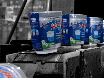 packages of DampRid on factory line.